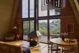 Deena and Austin wanted to embrace the midcentury modern origins of the home through their design choices. By positioning the furnishings toward the views, they always have a connection outside.