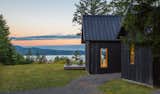 Quiet, dark volumes emphasize the natural beauty and views of Hood Canal.