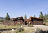 Exterior, Shed RoofLine, Metal Siding Material, House Building Type, Cabin Building Type, Metal Roof Material, and Wood Siding Material  Photo 4 of 13 in Wolf Creek Cabin by Prentiss + Balance + Wickline Architects