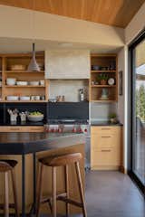 Milestone plaster walls and dark soapstone countertops reflect the colors of the site.