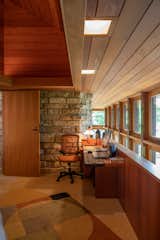 The office occupies a loft space off the entry.  Photo 7 of 17 in After 50 Years, a Frank Lloyd Wright Finally Got Built. Then It Spawned a Sibling.