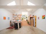 Once a two-car garage, Antonio's expanded studio is now a light-filled space connected to the ADU.