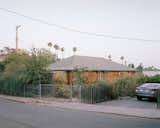 The chain-link fence that surrounds the property is both a sign of Frank Gehry's Santa Monica home and a reference to LA's historic urban fabric. "The use of a ubiquitous — and arguably traditional — material such as this is an attempt to create a subtle, slow and hopefully subconscious connection between our collective memory of the built environment and what I designed," Richard says. "The goal was to make new things that connect to our shared past in nuanced ways."