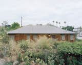 For the garden, Richard envisioned something that "was not fussy and did not require much maintenance," so David Godshall, Dawn Wang and the rest of the team at Terremoto integrated native and drought-tolerant plants with existing trees and roses. "Richard's architecture is very minimal, elemental and spare," says Godshall. "But he told us about the garden, "I want a completely chaotic landscape that you have to go through. No moves, just plants.'"