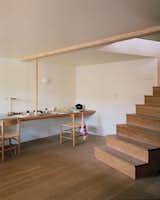 The lower level office occupies a space that the previous owner converted into a speakeasy/bar. Richard uses a separate structure on the property to create architectural models and "the noisier job I do," he says.  