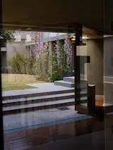These Hollyhocks growing in the patio appear in one of Janna Ireland’s photos of the house from her Even By Proxy exhibition, which was commissioned for Hollyhock House’s centennial and presented in partnership with Project Restore and the Julius Shulman Institute at Woodbury University.&nbsp;