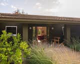 With no major structural work to do, the design team focused on things like color, and on the exterior they paired Benjamin Moore’s Cabbage Patch green with a front door painted in the company’s Tawny Day Lily. “Kim had a lot of really great people on the project,” Bestor explains, “and that made it possible to go super fast and still be design-y and not just do a white box.”