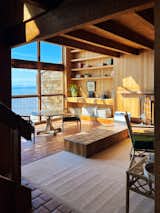 Though it boasted expansive views, the living room, like the rest of the house was cold and drafty.