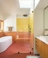 A skylight over the shower brings additional light into the space.