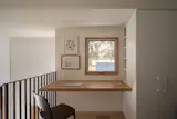 Salman Rauf of Sauf Works designed a floating desk in white oak for the workspace upstairs.