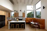 Sarah and Brant Barrah combined off-the-shelf elements like quartzite counters and oak cabinets with glazed ceramic ARTO "Kozo