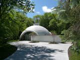 The Robert E. Schwartz House, designed by Robert Schwartz and nestled in Northwest Midland, features a dramatic concrete and styrofoam dome constructed with Dow Chemical technology.  Photo 4 of 5 in Defining an Architectural Canon From the Ground Up