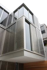 After: Alamo Square Residence exterior view of rear facing geometric pattern facade and picture windows