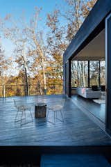 In ARCHITECTUREFIRM’s James River House, the 28-foot-long Series 600 Multi-Slide door is comprised of five 10-foot-tall panels of dual-paned, low-E glass, which helps keep the house warm during Virginia winters. All windows and doors feature thermally broken aluminum. "Western Window Systems," says architect Danny MacNelly, "does a great aluminum product that isn’t very expensive. The details are minimal, clean, and refined."