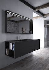 With clean lines and fewer limitations in application, FENIX cohesively wraps around this floating vanity, an elegant solution for bathroom surfacing.