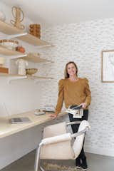 "I wanted a neutral space for my office so that I wasn’t swayed or distracted when designing for clients," shares Abbie. "My plywood wall-to-wall desk is as clean of a slate as it gets."