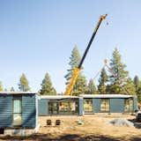 Ten years after Home 001, Homes 100 and 101 are delivered to their building site in Truckee, California. Looking ahead to the future, Connect Homes plans to explore multi-unit construction, on- and off-grid solutions, and rapid-deploy housing to address homelessness in urban communities.