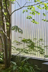 “The garden activates seclusion from the mundane world, creates tranquility in the city, and liberates the mind in the passage between the mundane world and nature,” says Principal Architect Hiroshi Nakamura. “When people feel stressed, they can look out the window at the garden and transfer their mind to it.”