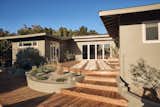 “I splurged on the deck in the back, but that made the biggest difference and is seen from all parts of the home,” says Leah. The deck running from the living room to the pool “creates the most amazing outdoor hosting space,” she shares.