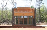 Ipe, cedar, ledgestone, and cement board materials complement one another