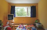 Brightly-painted children's bedroom