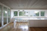 A Large Kitchen Island Anchors the Open Living Space