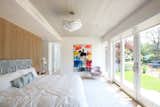 The Master Bedroom Opens to the Exterior with Sliding Glass Doors