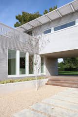 Spanning Second Story Modules Create Covered Entry Deck