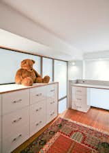 Daylighting and Strategic Artificial Lighting Help Make the Low Ceiling Heights Feel More Expansive