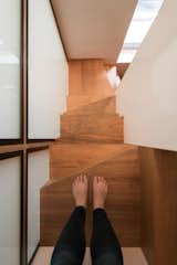 The Double Height Stair Path Allows Daylight Into the Loft and Playroom