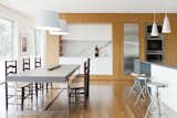 Open Dining and Kitchen with Teak Cabinetry