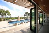 Entertaining Space Opens to Existing Pool Deck