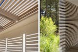Bleached cedar slats at garage brise soleil and breezeway slat wall.