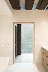 The thicket of bamboo to the rear also offers a lovely view and privacy to the primary bathroom.