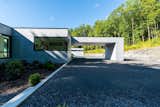 Exterior, Prefab Building Type, Glass Siding Material, House Building Type, and Flat RoofLine The carport signals arrival and entry.  Photo 5 of 23 in West Stockbridge Residence by Resolution: 4 Architecture