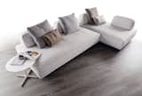 The Flex is not your Grandma’s sofa. Characterized by an absence of division between front, back, right, and left, this modular couch can be arranged in a variety of configurations adaptable to any environment or occasion. Movable backrests maximize comfort and allow the Flex to transform from couch to lounge, and even into a free-standing bed, with ease.