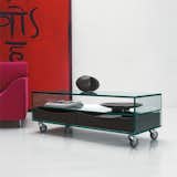 The Como Basso coffee table is perfect for storage and fits seamlessly under the Swing wall bed when it is pulled down. The wheels make moving the Como Basso a breeze!   Resource Furniture’s Saves from Two Film Industry Veterans Flip the Script With a Suburb-to-City Move