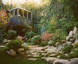A couple transform their backyard into a botanical children’s playland and an ideal entertaining spot.
