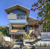 Keyan Mizani and Alexia Zerbinis work from a ground-floor storefront studio that could be converted to either a garage or a leasable accessory dwelling unit.