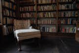 A library just off the living room, which in the house's promotional video includes books sliding off the shelves by themselves  Photo 5 of 7 in The Haunted House From “The Conjuring” Is Up for Sale Just in Time for Halloween