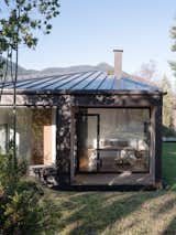 The master bedroom makes for a quiet getaway even when the house is filled with people, occupying its own corner of the L-shaped home.