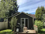 Clint's dog Eutaw approved of the ample back yard, but even after expanding the home, there was still plenty of greenspace left to.