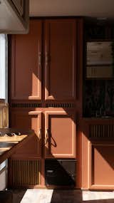 The remade cabinets near the bathroom became a focal point, getting their own paint color.