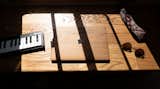 The top of the desk, made from different pieces of wood  Photo 9 of 17 in Budget Breakdown: A Woodworker Couple Make $10K Go the Distance Renovating a 2006 Camper