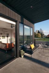 A large overhang and sliding glass door make the home's great room an ideal opportunity for indoor-outdoor living.