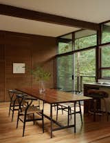 A table by Seattle studio Chadhaus complements the existing oak floors and cedar walls.