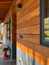 The renovated home is distinctive for its unpainted cedar cladding, paired with fiber-cement siding.  Photo 3 of 21 in Budget Breakdown: A $336K Cottage Renovation Gives an Oregon Widow a Fresh Start