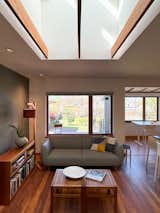 Building new roof trusses and gables made it easy to add a large skylight in the living room.