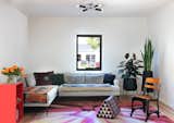 The new living area is enlivened by a rug that architect Michael Howell co-designed.