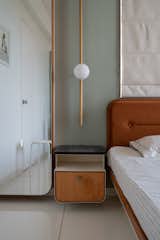 Nearly all the home's custom furniture pieces, such as the master bedroom bed and nighstands, are floating, to achieve an overall sense of lightness.